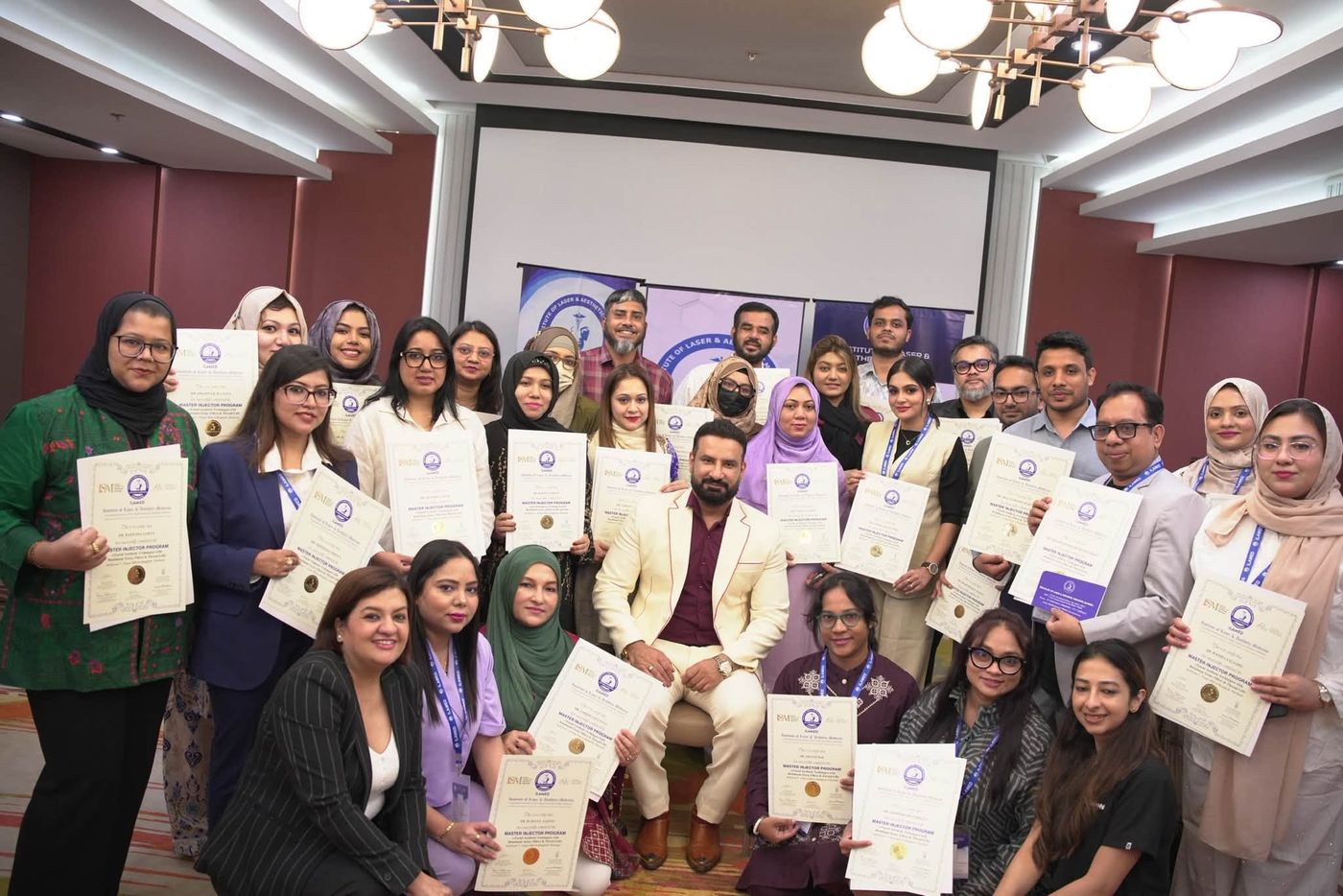With fellow Master Injector Program graduates